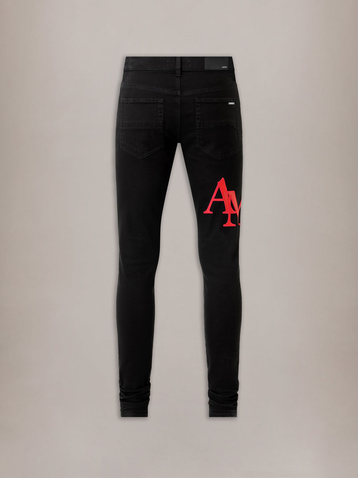 STAGGERED LOGO SKINNY JEAN - Black Red