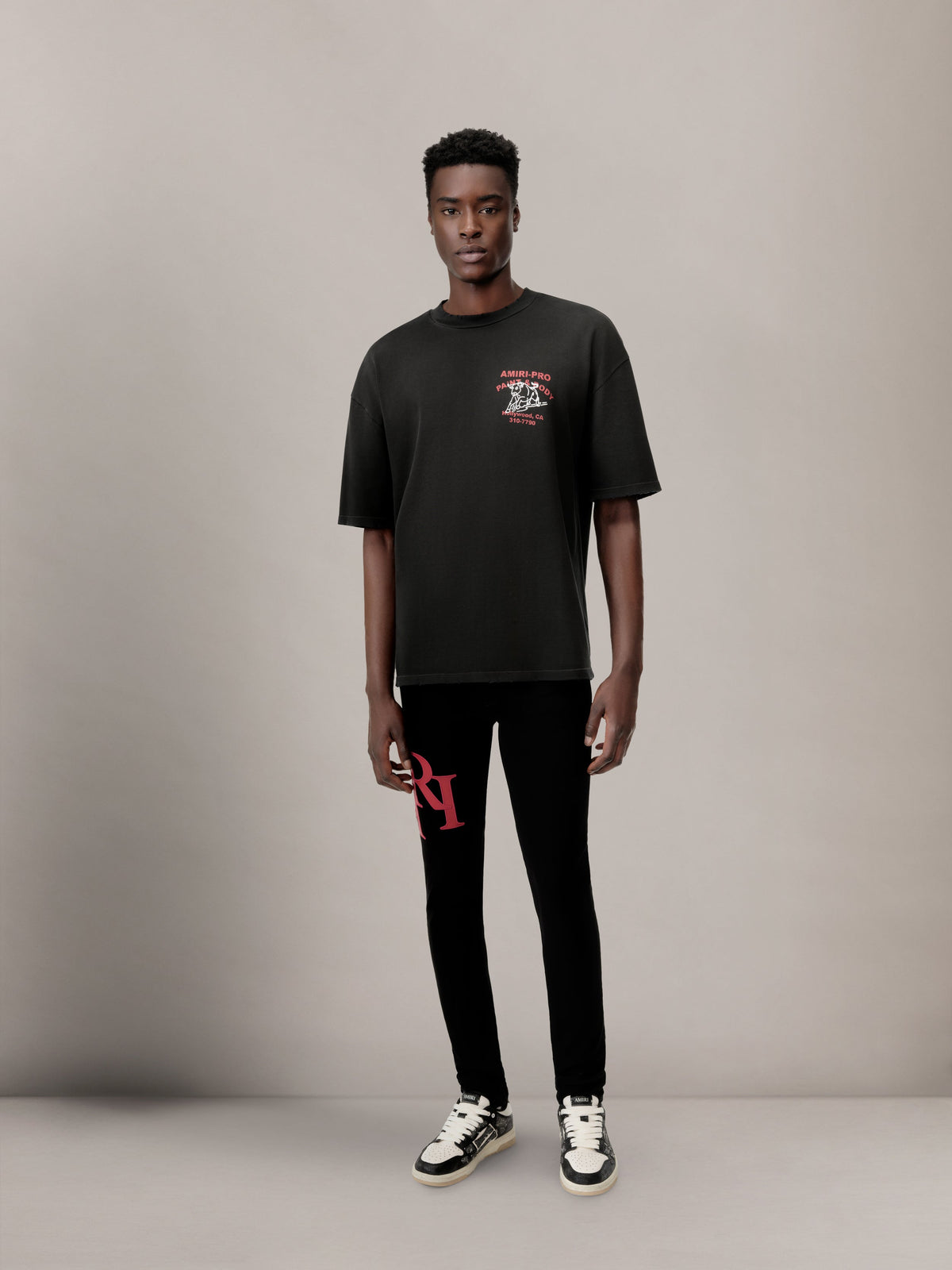 STAGGERED LOGO SKINNY JEAN - Black Red
