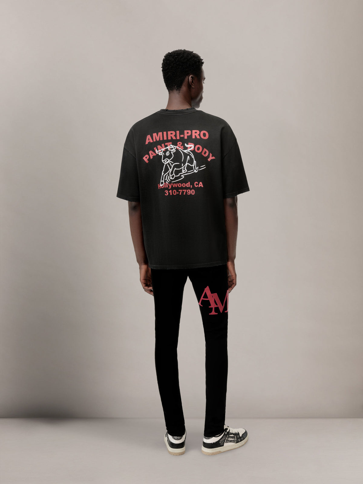 STAGGERED LOGO SKINNY JEAN - Black Red
